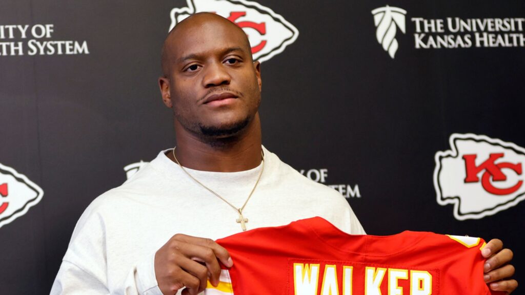 Kenneth Walker carrying the football in his new Kansas City Chiefs uniform during an NFL game