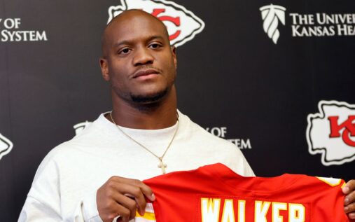 Kenneth Walker carrying the football in his new Kansas City Chiefs uniform during an NFL game