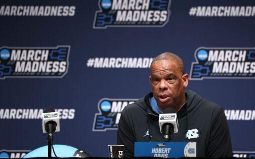College basketball players from Kansas, Kentucky and North Carolina looking dejected on the court