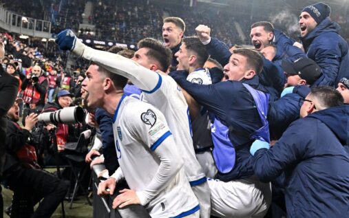 Kosovo national football team players celebrating on the pitch
