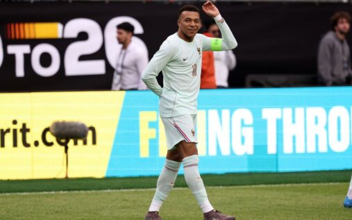 Kylian Mbappe controlling the ball for France during their international friendly match against Brazil