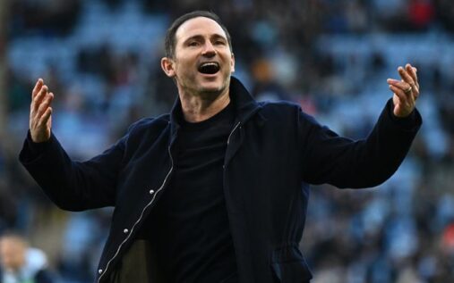 Frank Lampard applauding fans from the touchline while wearing a Coventry City tracksuit jacket during a match