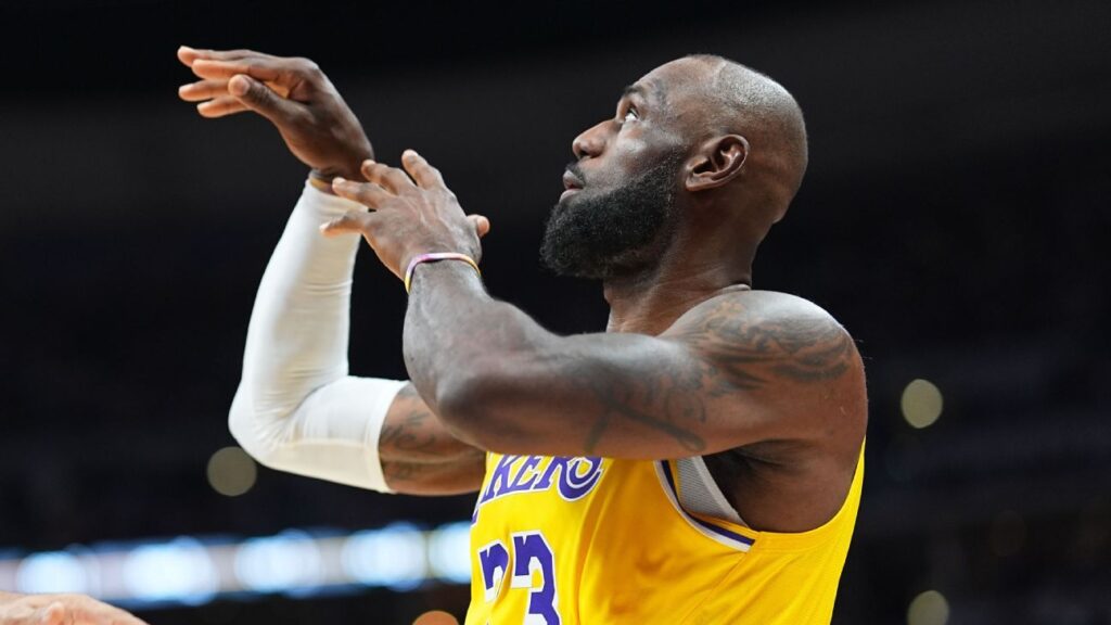 LeBron James shooting a jump shot for the Los Angeles Lakers against the Denver Nuggets