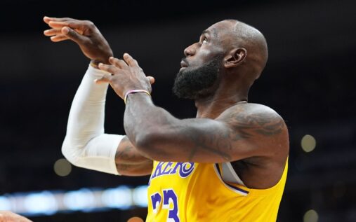 LeBron James shooting a jump shot for the Los Angeles Lakers against the Denver Nuggets