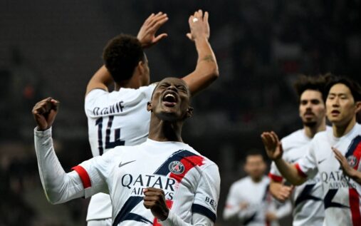 RC Lens and Paris Saint-Germain players competing on the pitch during a Ligue 1 match