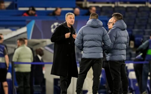 Paris Saint-Germain players lining up on the pitch ahead of a Champions League football match