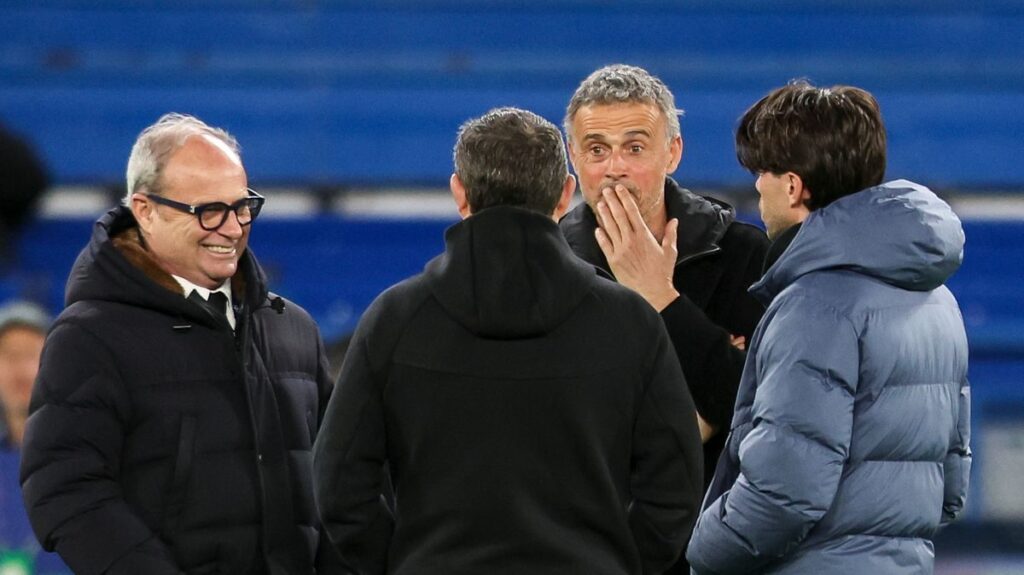 Lens manager Pierre Sage looking serious on the touchline during a match