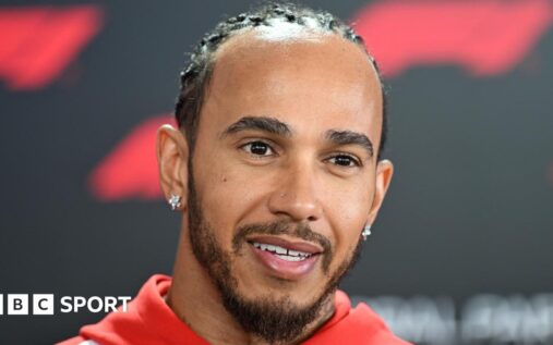 Lewis Hamilton driving his Ferrari Formula 1 car during a thrilling grand prix battle on track