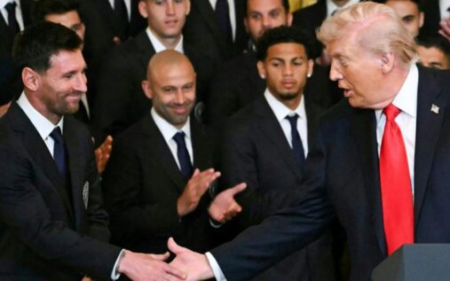 Lionel Messi standing with Inter Miami team-mates and Donald Trump during a ceremony at the White House