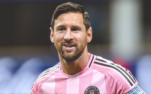 Lionel Messi looking focused while playing for Inter Miami in their pink home kit