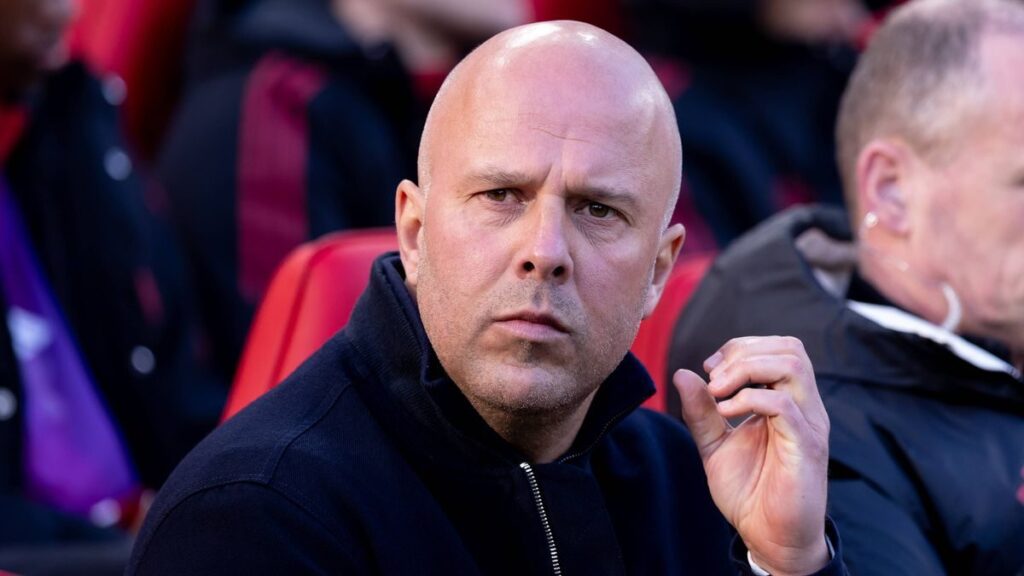 Liverpool manager Arne Slot watching his team from the touchline