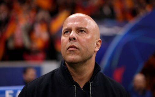 Liverpool manager Arne Slot looking thoughtful on the touchline