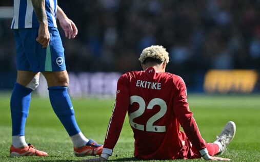 Hugo Ekitike receiving medical attention on the pitch for Liverpool