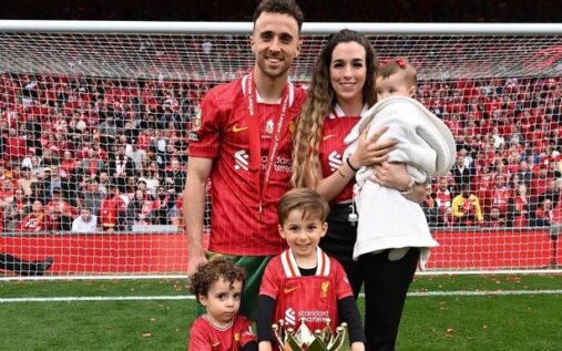 Liverpool fans displaying a tribute banner for Diogo Jota in the away end at Molineux