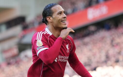 Arne Slot gesturing on the touchline while watching Liverpool players crowd the six-yard box during a corner kick