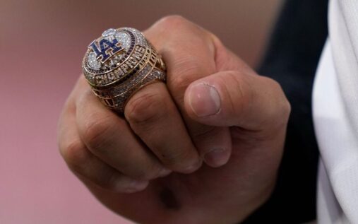 Shohei Ohtani and Los Angeles Dodgers players displaying their 2025 World Series rings during a pregame ceremony