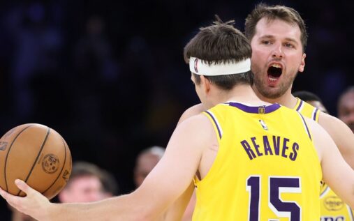 Luka Doncic of the Los Angeles Lakers shoots a step-back jump shot against the Denver Nuggets