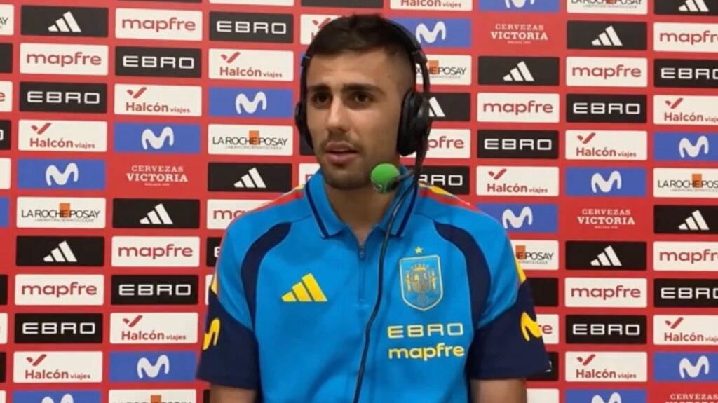 Manchester City midfielder Rodri looking serious during a press conference