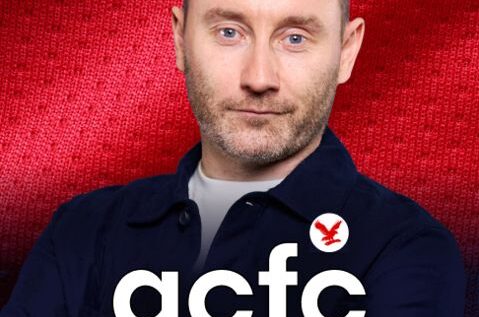 Manchester City winger Jeremy Doku looking determined on the pitch