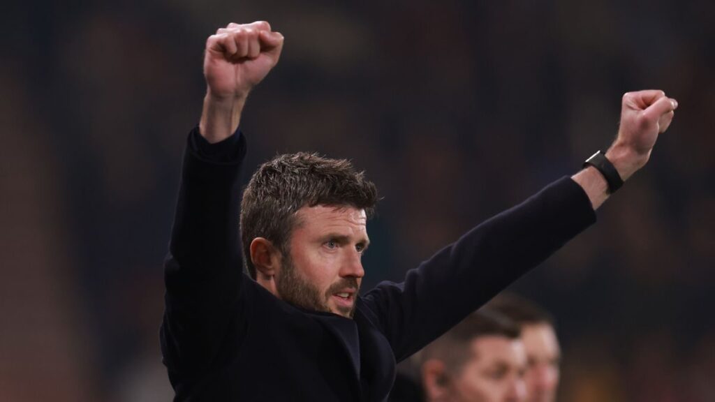Manchester United interim manager Michael Carrick giving instructions on the touchline during a Premier League match
