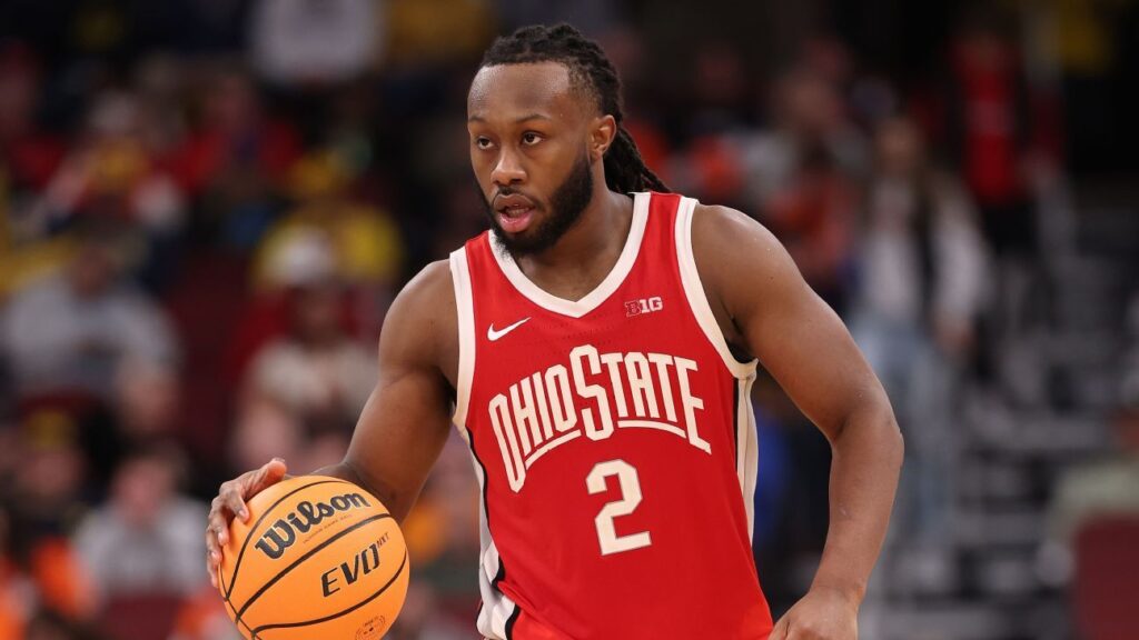 A basketball tip-off during a men's NCAA Tournament March Madness game