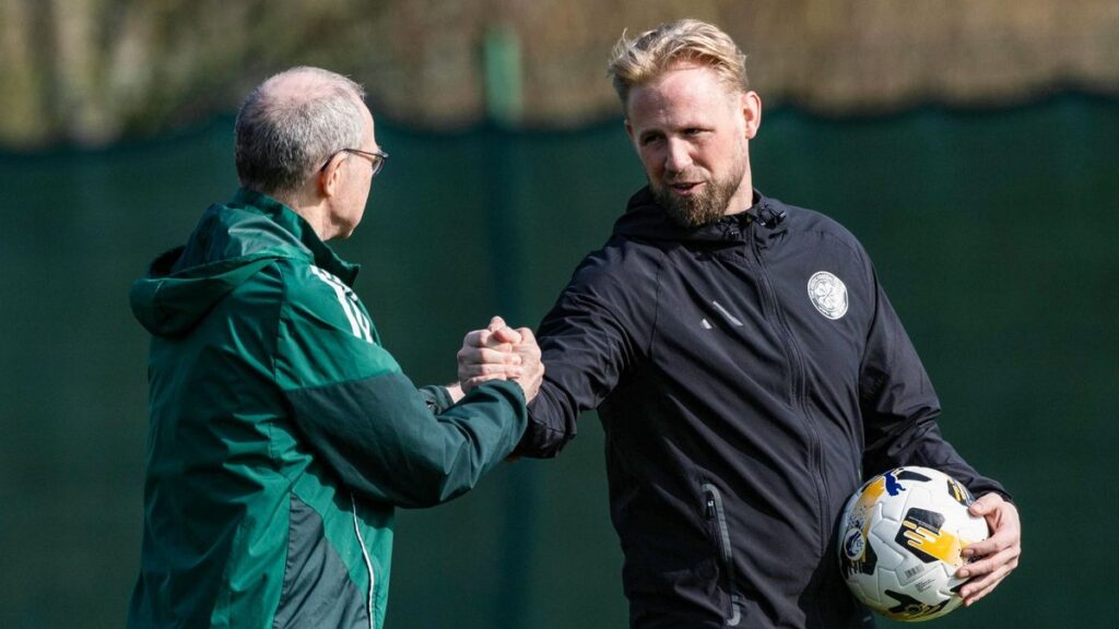 Celtic manager Martin O'Neill looking thoughtful on the touchline during a match.