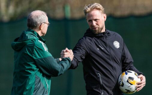 Celtic manager Martin O'Neill looking thoughtful on the touchline during a match.