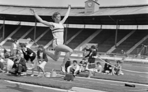 Mary Rand competing in the long jump at the 1964 Tokyo Olympic Games
