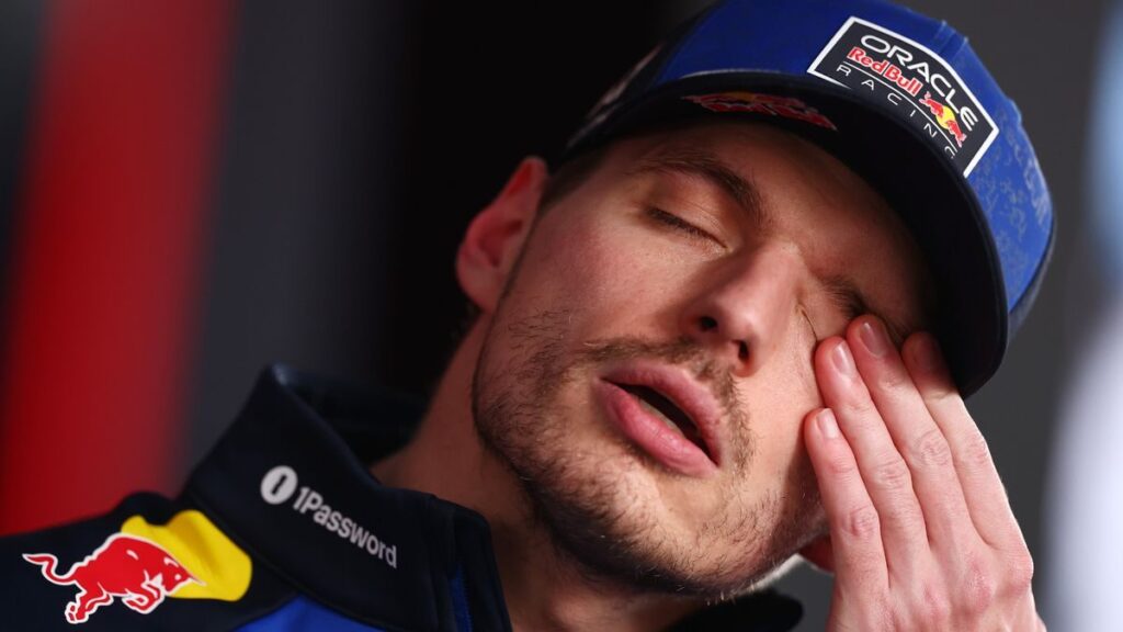 Red Bull driver Max Verstappen looking disappointed in the Formula 1 paddock