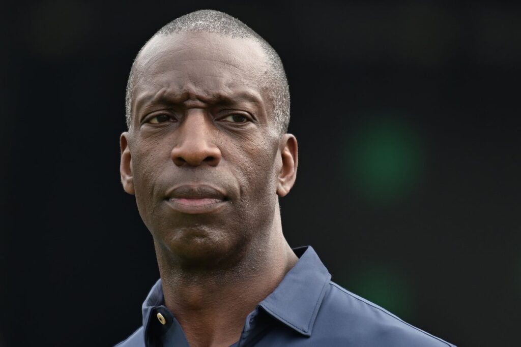 Michael Johnson looking serious at an international athletics event