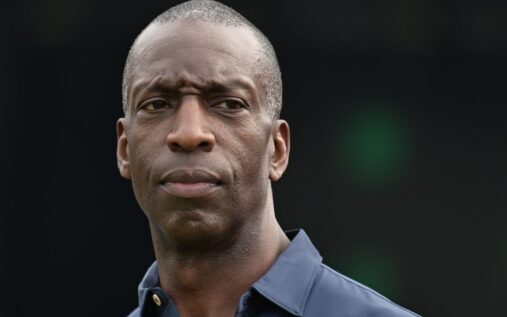 Michael Johnson looking serious at an international athletics event