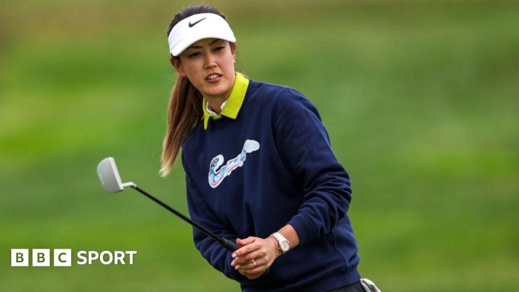 Michelle Wie West preparing to swing a golf club during an LPGA Tour tournament