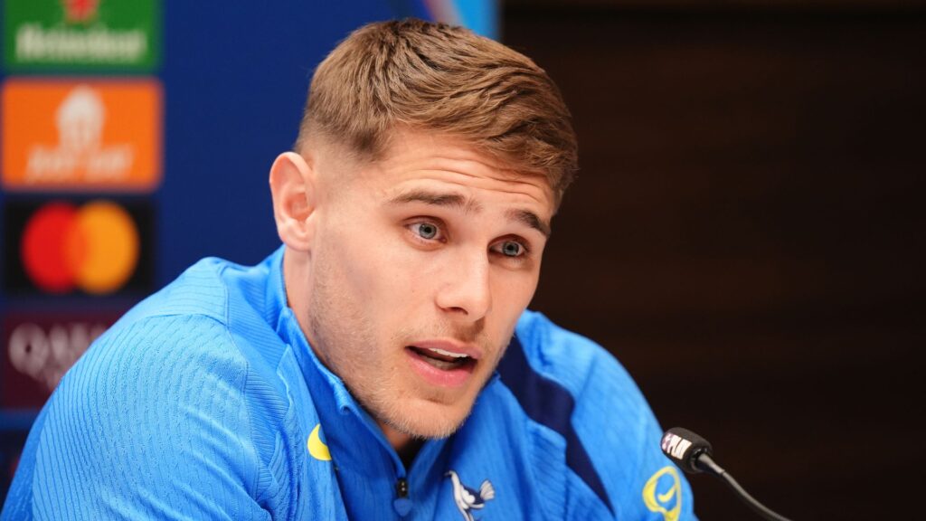 Micky van de Ven speaking at a Tottenham Hotspur press conference