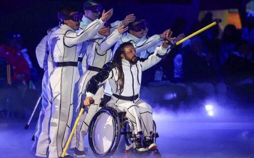 The Paralympic flag being waved during the spectacular closing ceremony of the Milan-Cortina 2026 Winter Games