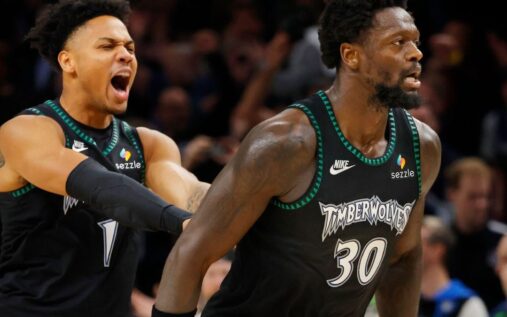 Julius Randle taking a jump shot for the Minnesota Timberwolves against the Houston Rockets
