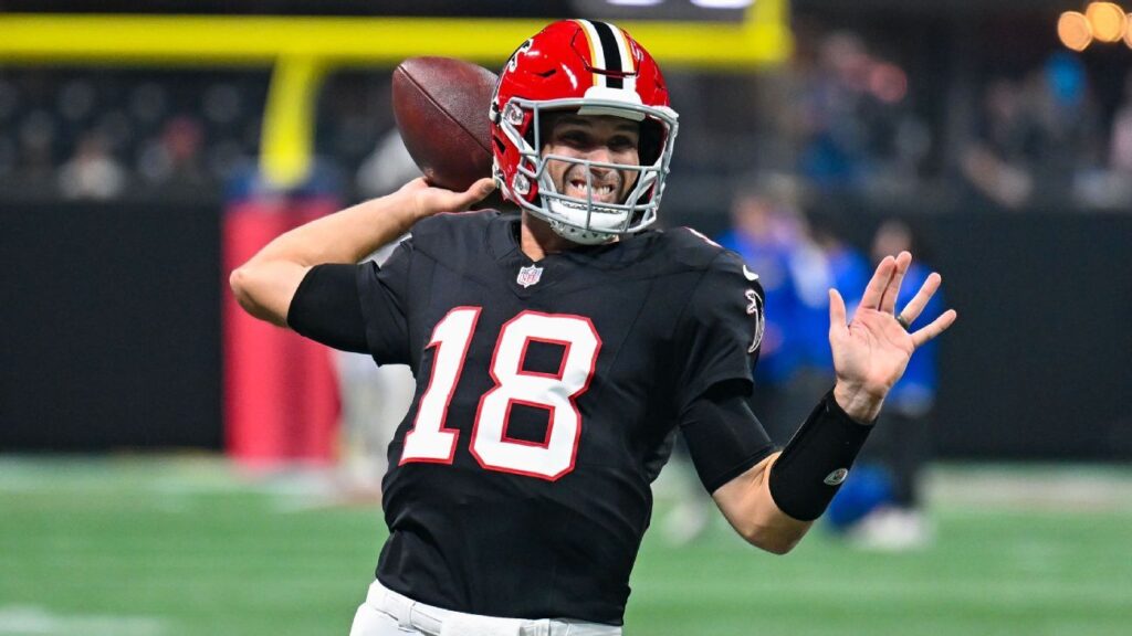 Minnesota Vikings quarterback J.J. McCarthy looking on from the sidelines during an NFL game