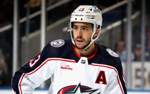 Portrait of NHL star Johnny Gaudreau skating on the ice