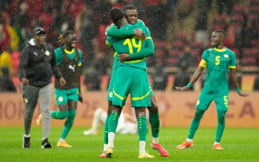 Morocco national football team players celebrating on the pitch