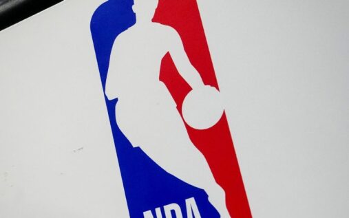 NBA logo on a basketball court during a draft lottery event