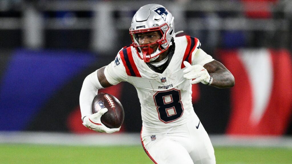 Stefon Diggs warming up in a New England Patriots uniform before an NFL game