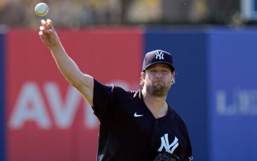 New York Yankees pitcher Gerrit Cole throwing a baseball from the mound