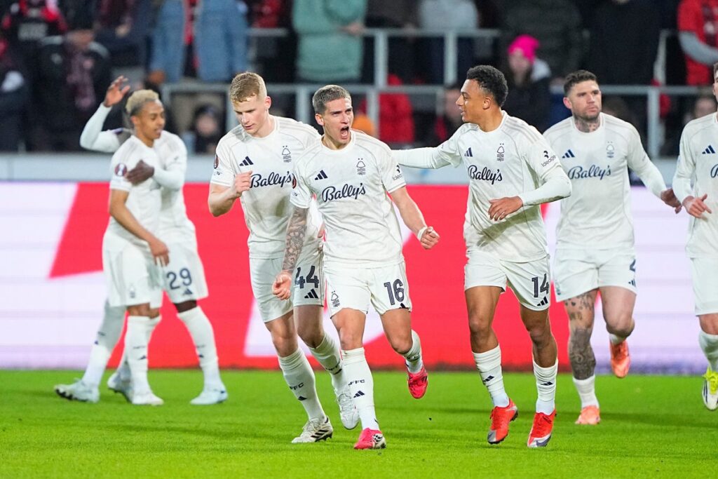 Nottingham Forest players celebrating their penalty shootout victory against Midtjylland in the Europa League