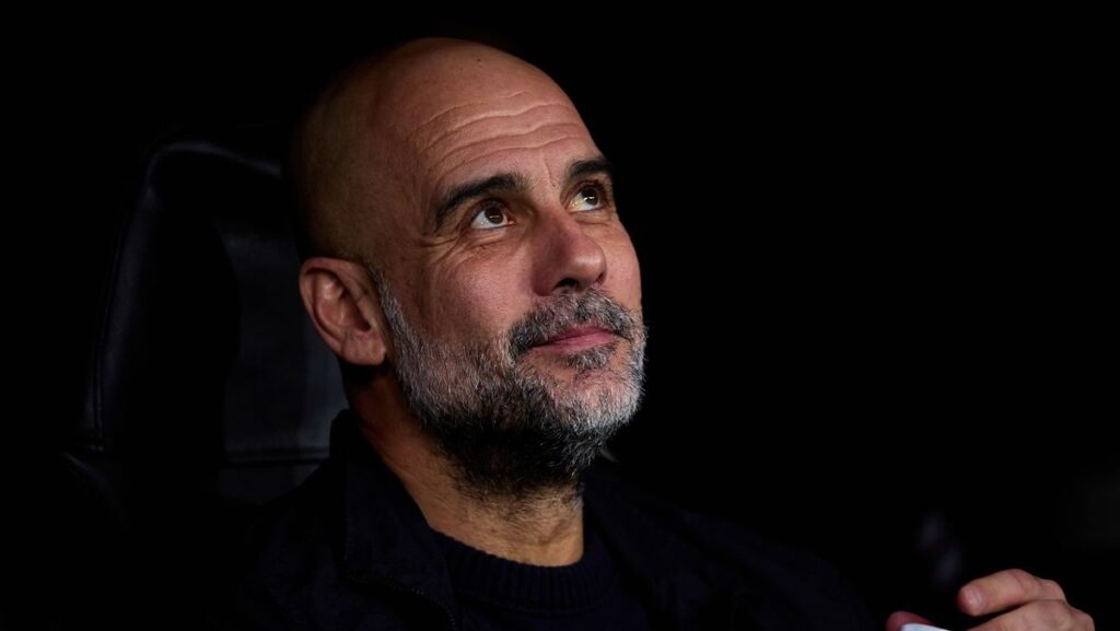 Manchester City manager Pep Guardiola looking pensive on the touchline