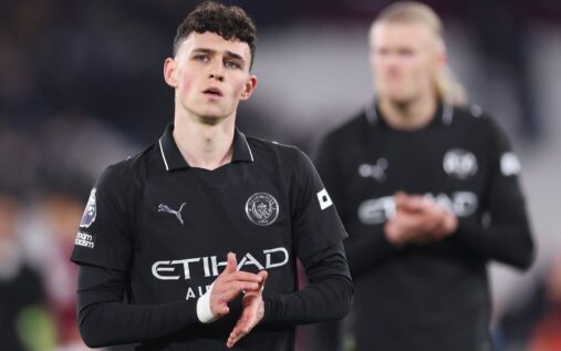 Phil Foden playing for Manchester City in a Premier League match