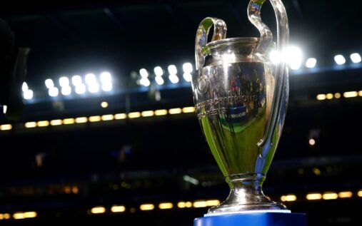 The Champions League trophy displayed alongside the Premier League logo