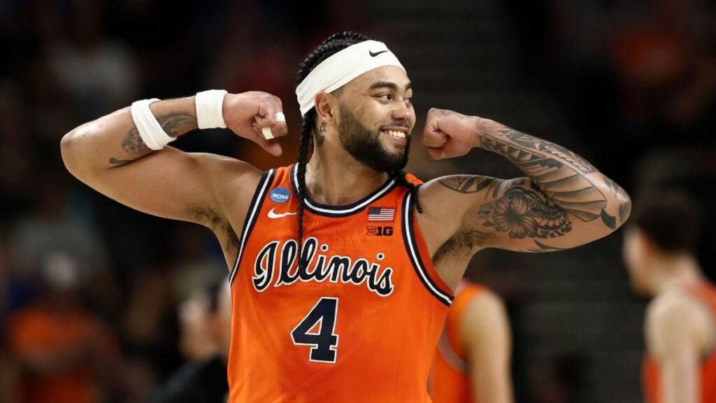 Purdue and Texas basketball players competing on court during the NCAA Tournament
