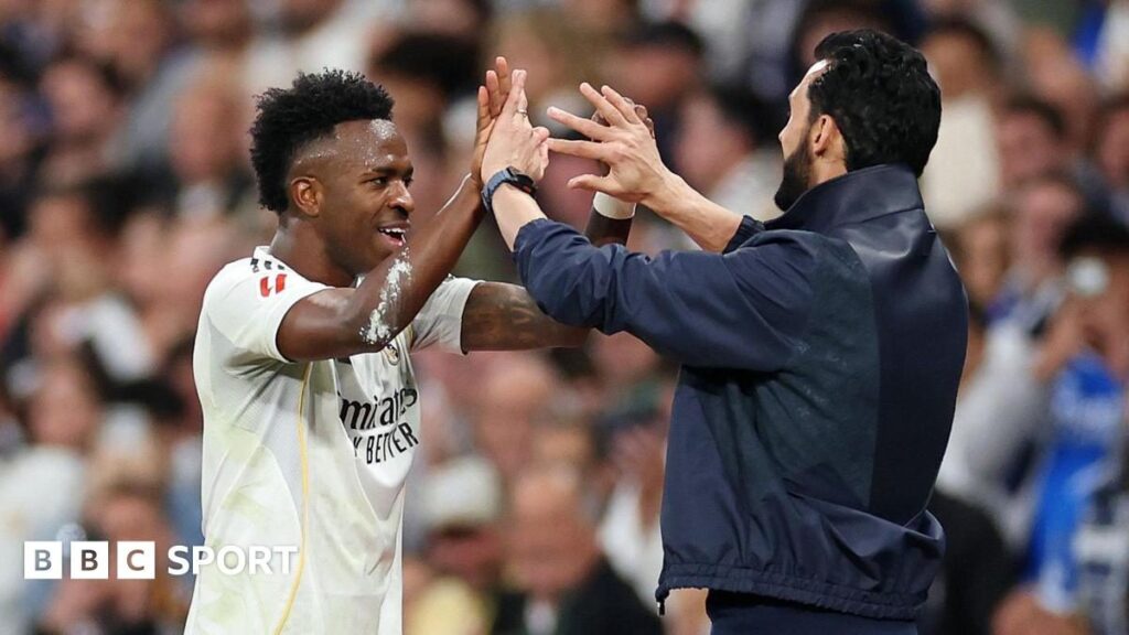 Real Madrid manager Alvaro Arbeloa giving tactical instructions to forward Vinicius Junior