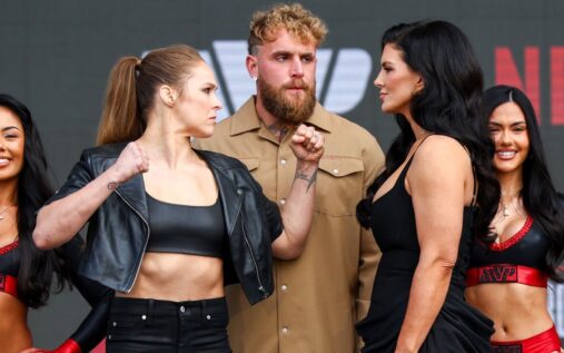 Ronda Rousey and Gina Carano facing off at a press conference to promote their upcoming mixed martial arts bout