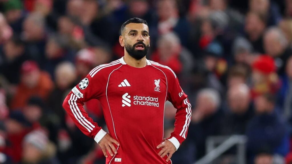 Mohamed Salah looking disappointed on the pitch in a Liverpool kit