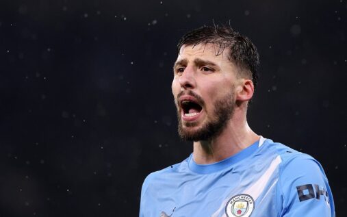 Ruben Dias playing for Manchester City wearing the sky blue home kit